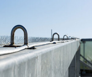 Anchors on a rooftop wall