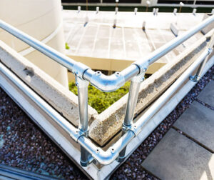 Guardrails around a building rooftop perimeter.