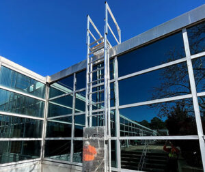 Ladder on a glass building