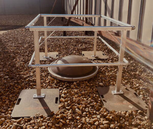 guardrail around a skylight on a rooftop